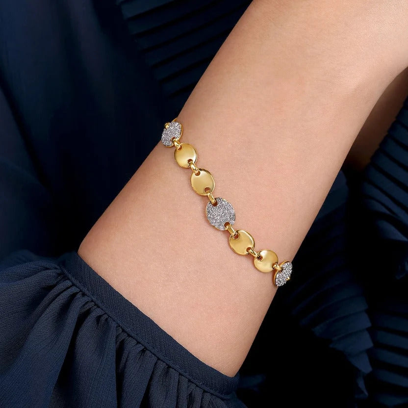 A 14K Yellow Gold Contemporary Diamond Tennis Bracelet available at Dunkin’s Diamonds.