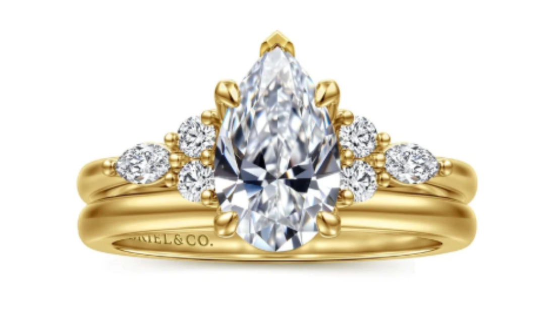 Yellow Gold Pear Shape Semi Mount Cluster Ring available at Dunkin’s Diamonds.