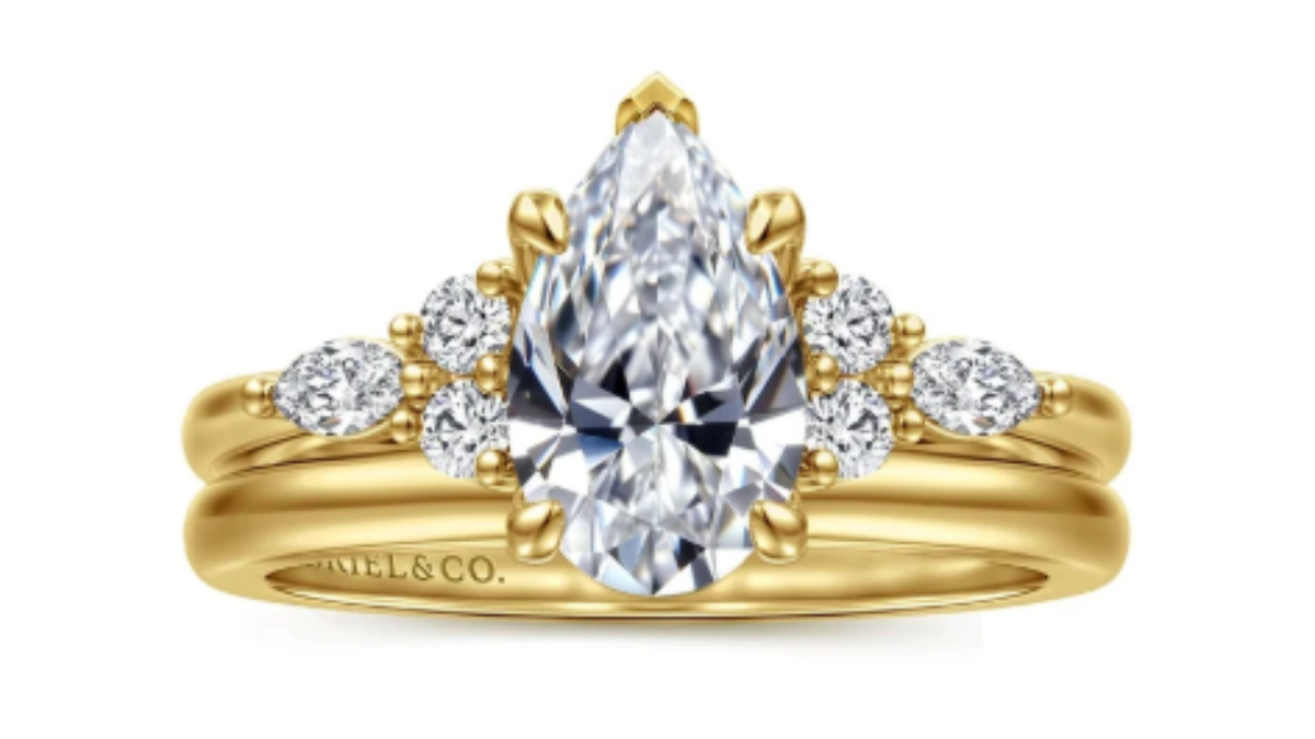 Yellow Gold Pear Shape Semi Mount Cluster Ring available at Dunkin’s Diamonds.