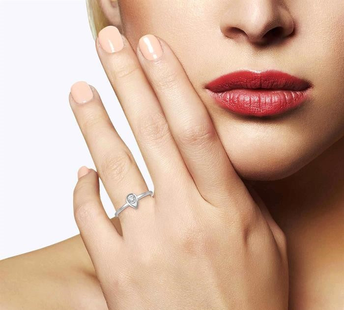1/50 Ctw Pear Shape Round Cut Diamond Promise Ring in 10K White Gold