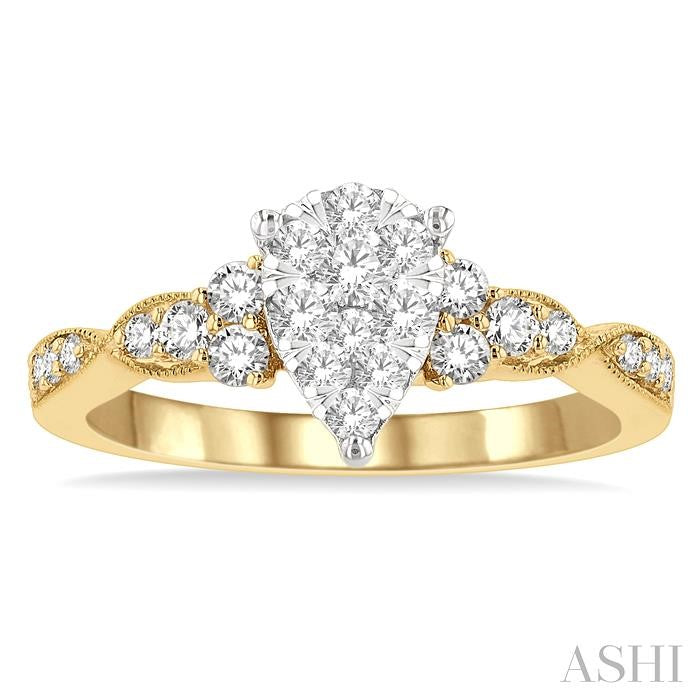 1/2 Ctw Pear Shape Center Criss Cross Carved Shank Shine Bright Round Cut Diamond Engagement Ring in 14K Yellow and White Gold