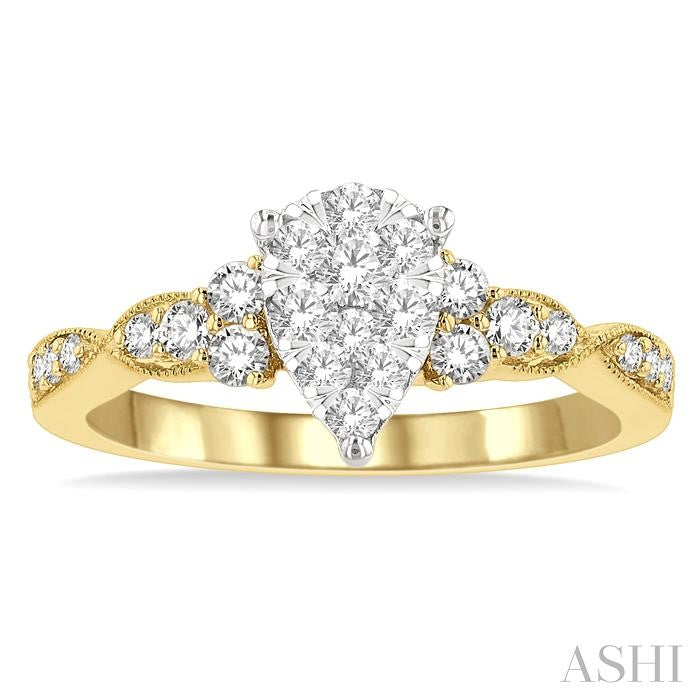 1/2 Ctw Pear Shape Center Criss Cross Carved Shank Shine Bright Round Cut Diamond Engagement Ring in 14K Yellow and White Gold