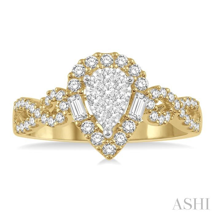 1/2 Ctw Pear Shape Bow Shank Shine Bright Round and Baguette Diamond Ring in 14K Yellow and White gold