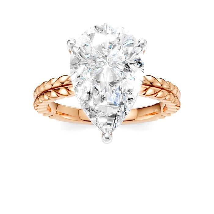 1/8 Ctw Pear Shape Round Cut Diamond Semi-Mount Engagement Ring in 14K Rose and White Gold