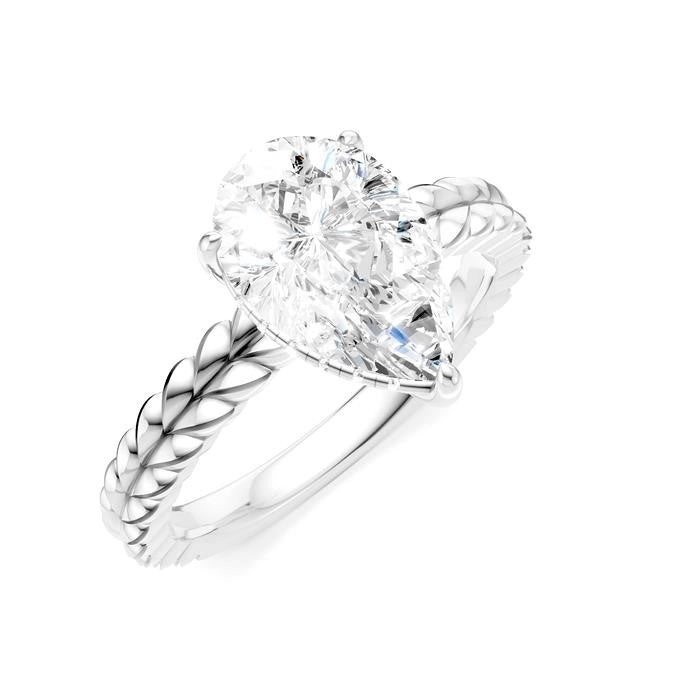 1/10 Ctw Pear Shape Round Cut Diamond Semi-Mount Engagement Ring in 14K White Gold