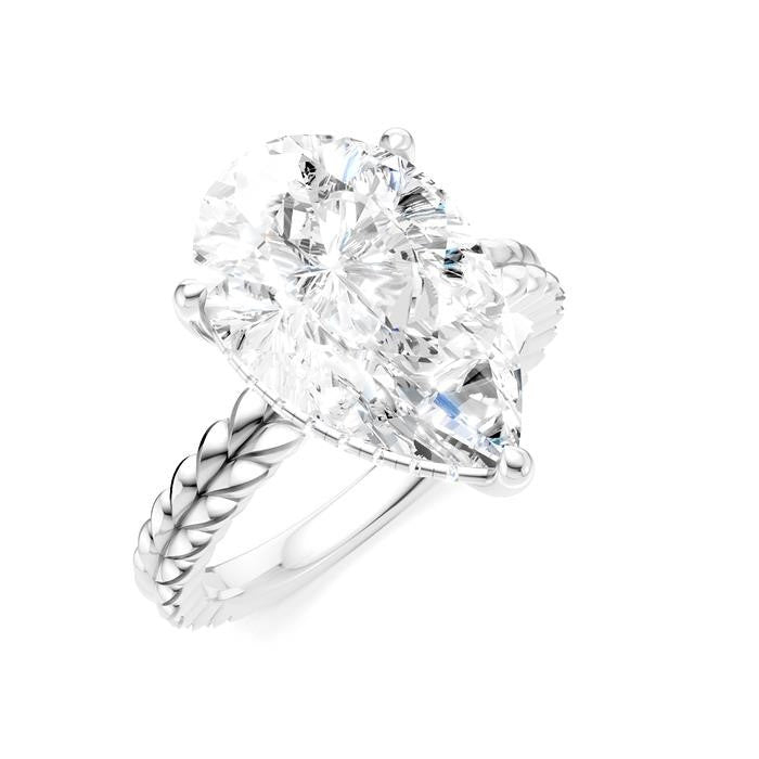 1/8 Ctw Pear Shape Round Cut Diamond Semi-Mount Engagement Ring in 14K White Gold