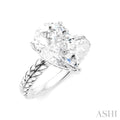 1/10 Ctw Pear Shape Round Cut Diamond Semi-Mount Engagement Ring in 14K White Gold