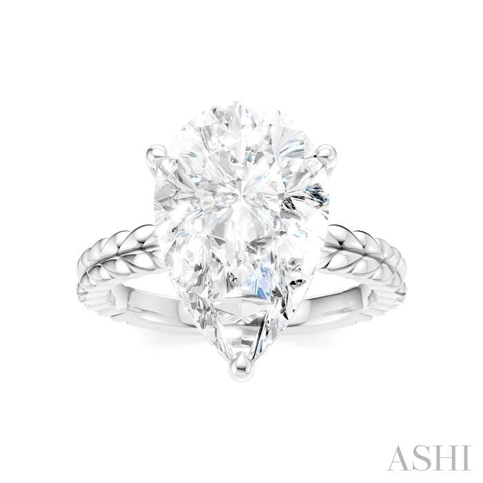 1/8 Ctw Pear Shape Round Cut Diamond Semi-Mount Engagement Ring in 14K White Gold