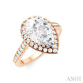 1/2 Ctw Pear Shape Round Cut Diamond Halo Semi-Mount Engagement Ring in 14K Rose Gold