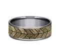 The Chevron Yellow Gold This 7mm comfort fit ring is made with Grey Tantalum and Yellow Gold, featuring a Chevron wood Pattern
