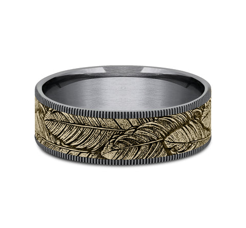 The Covey This 7.5mm comfort fit ring is made with Grey Tantalum and 14k Yellow Gold , featuring a feather design