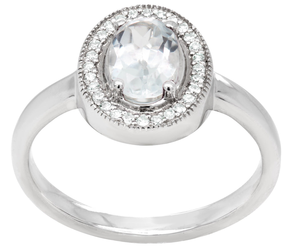 Oval White Topaz and Diamond Halo Ring