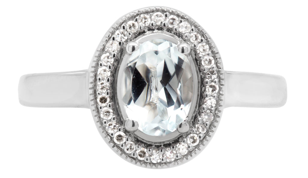 Oval White Topaz and Diamond Halo Ring