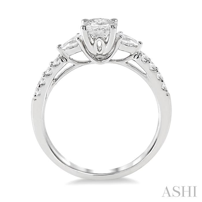 7/8 Ctw Pear & Round Cut Diamond Engagement Ring With 1/2 Ct Oval Cut Center Stone in 14K White Gold