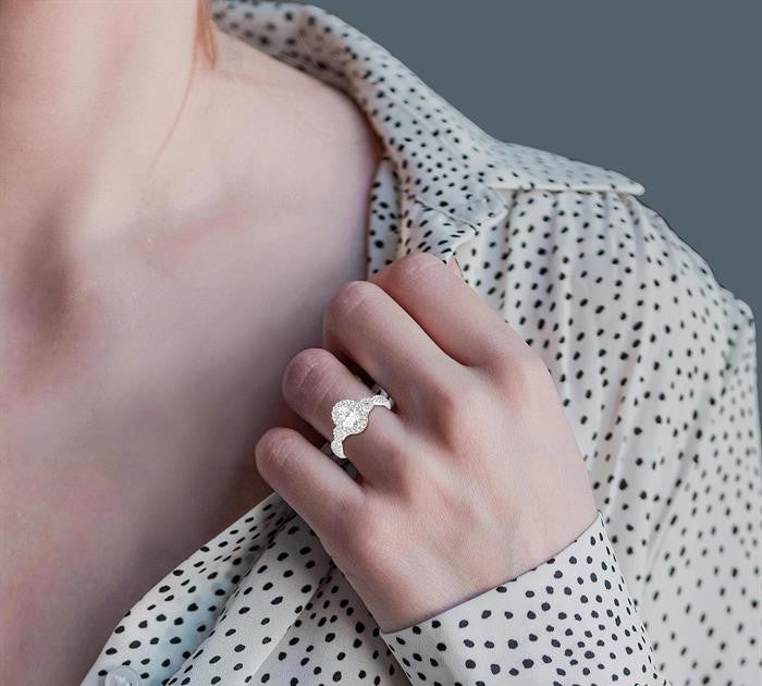 1/2 Ctw Oval Cut Diamond Ladies Engagement Ring with 1/3 Ct Oval Cut Center Stone in 14K White Gold