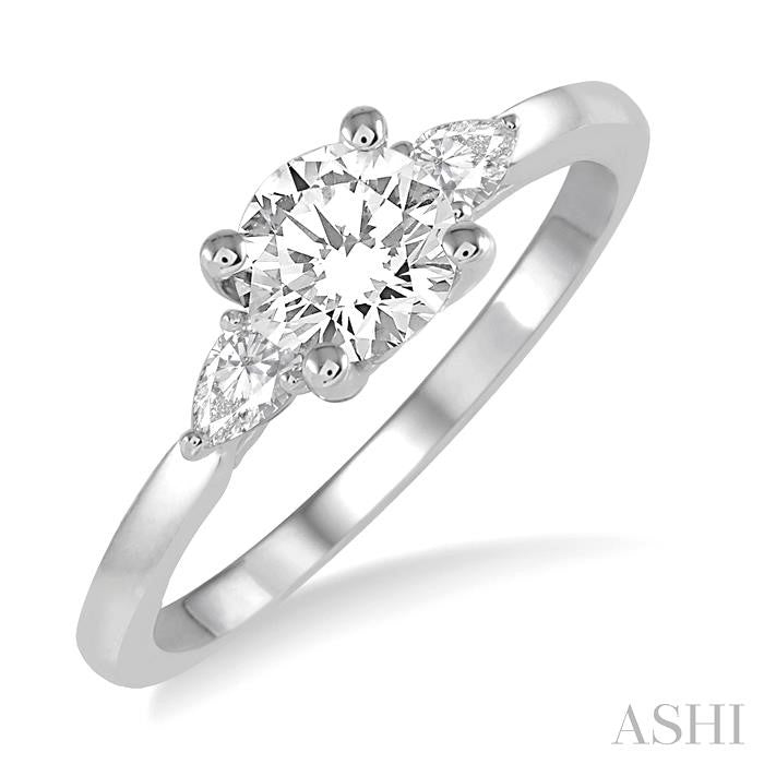 3/4 Ctw Pear and Round Cut Diamond Ladies Engagement Ring With 1/2 Ct Round Cut Center Stone in 14K White Gold