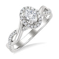 1/2 Ctw Twisted Shank Round Cut Diamond Halo Engagement Ring With 1/3 Ct Oval Cut Diamond Center Stone in 14K White Gold