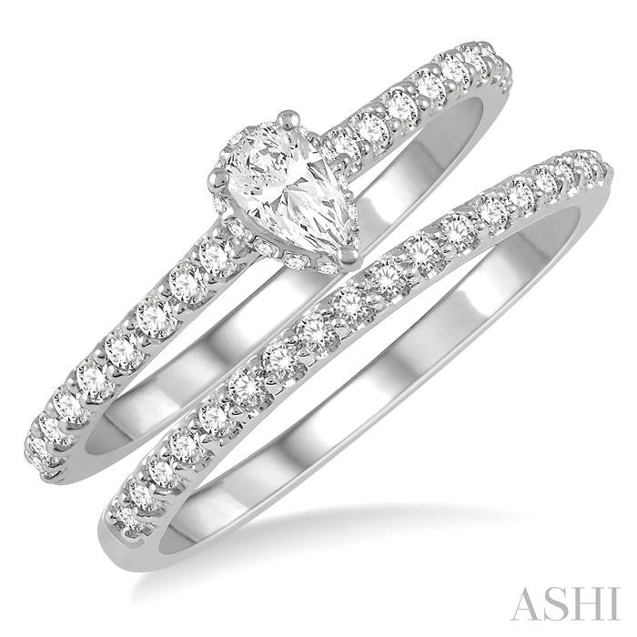 5/8 Ctw Round Cut Diamond Wedding Set With 1/2 Ct Pear Cut 1/4 Ct Center Stone Engagement Ring and 1/6 Ct Wedding Band in 14K White Gold