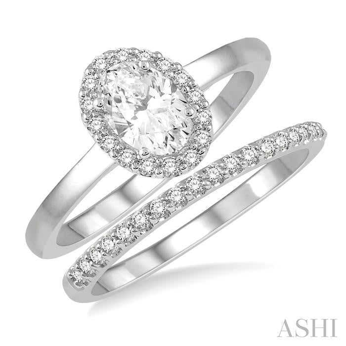3/8 Ctw Round Cut Diamond Wedding Set With 1/3 Ct Halo 1/4 Ct Oval Cut Center Stone Engagement Ring and 1/10 Ct Wedding Band in 14K White Gold