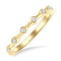 1/10 Ctw Bezel Set Round Cut Diamond Stackable Wedding Band in 14K Yellow Gold
