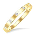 1/4 Ctw Flush Bezel Set Diamond Fashion Band in 14K Yellow Gold
