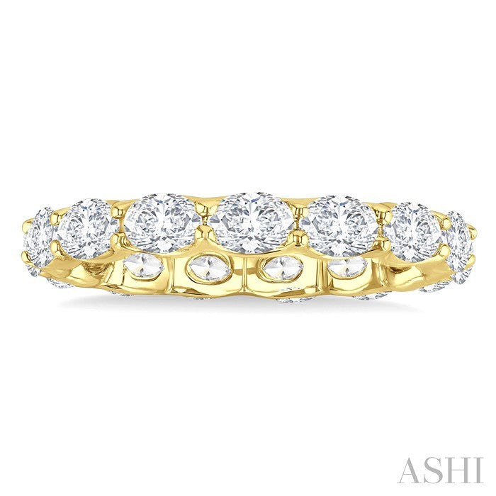 2 1/6 Ctw East-West Set Oval Cut Diamond Eternity Wedding Band in 14K Yellow Gold