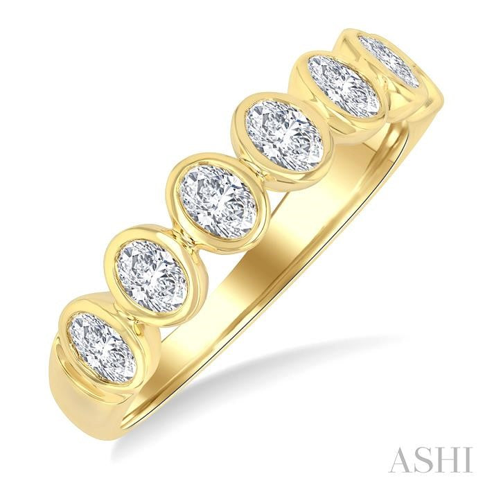 1 Ctw 7 Stone Bezel Set Oval Cut Diamond Fashion Band in 14K Yellow Gold
