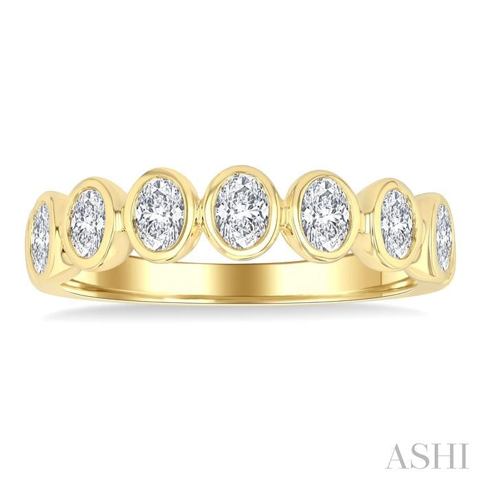 1 Ctw 7 Stone Bezel Set Oval Cut Diamond Fashion Band in 14K Yellow Gold