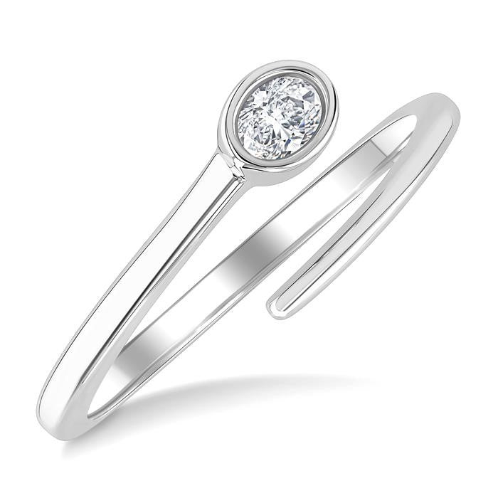 1/6 Ctw Bypass Bezel Set Oval Cut Diamond Open Fashion Ring in 14K White Gold