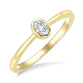 1/5 Ctw Bezel Set Oval Cut Diamond Fashion Ring in 14K Yellow Gold