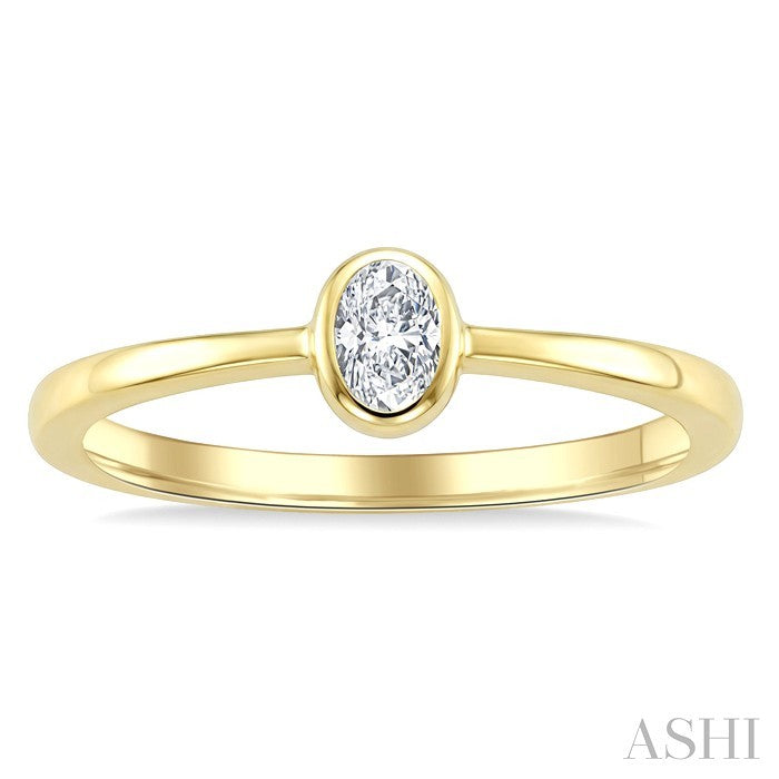 1/5 Ctw Bezel Set Oval Cut Diamond Fashion Ring in 14K Yellow Gold