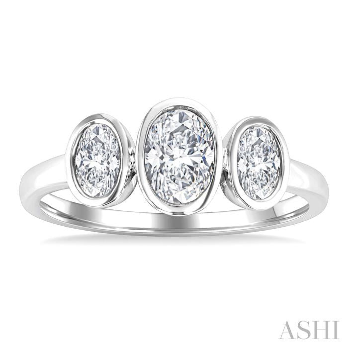 1 Ctw 3-Stone Bezel Set Oval Cut Diamond Ring in 14K White Gold