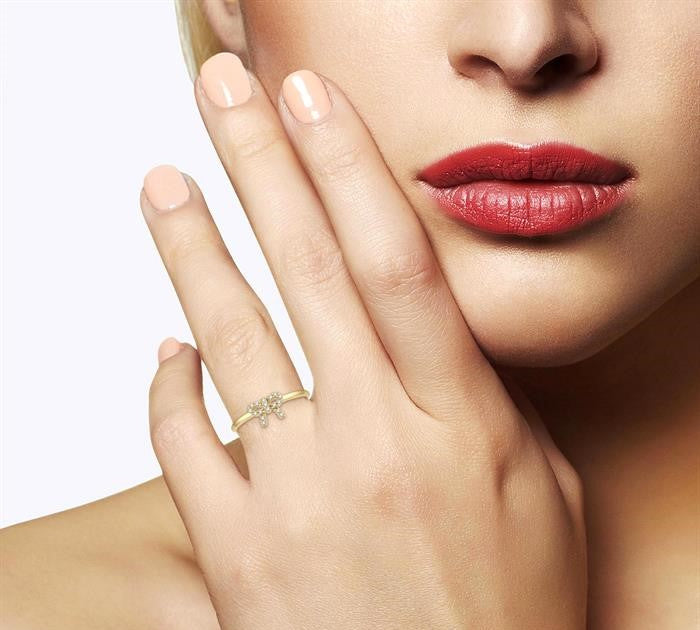1/10 Ctw Bow Cutout Round Cut Diamond Petite Fashion Ring in 10K Yellow Gold