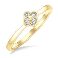 1/8 Ctw Clover Bezel Set Round Cut Diamond Petite Fashion Ring in 10K Yellow Gold