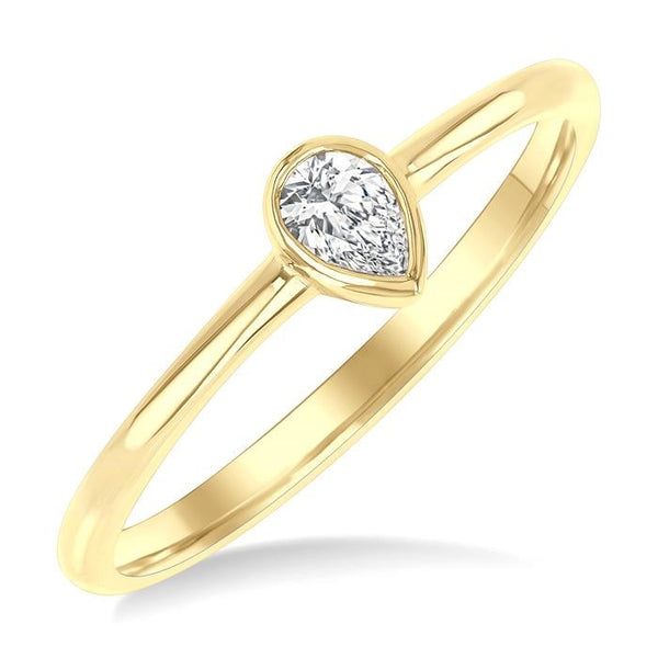 1/6 Ctw Petite Bezel Set Pear Cut Diamond Fashion Ring in 10K Yellow Gold