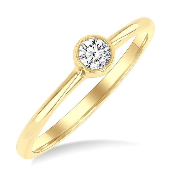 1/6 Ctw Petite Bezel Set Round Cut Diamond Fashion Ring in 10K Yellow Gold