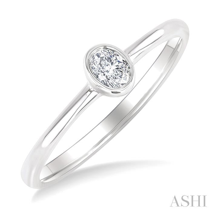 1/6 Ctw Petite Bezel Set Oval Cut Diamond Fashion Ring in 10K White Gold