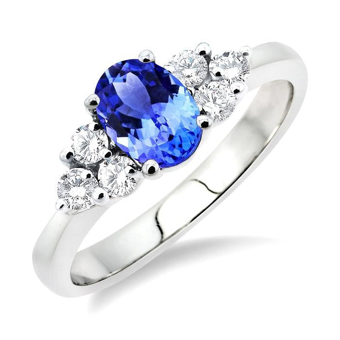 7X5 MM Oval Cut Tanzanite and 1/3 Ctw Round Cut Diamond Ring in 14K White Gold