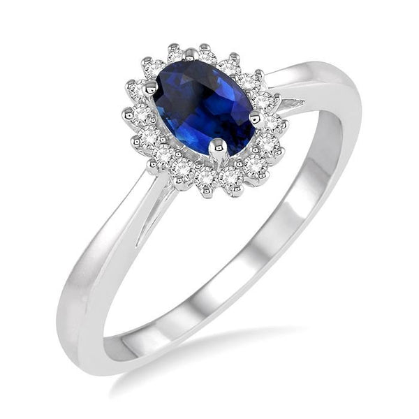 6X4 MM Oval Cut Sapphire Center and 1/8 Ctw Round Cut Diamond Halo Precious Stone Ring in 10K White Gold