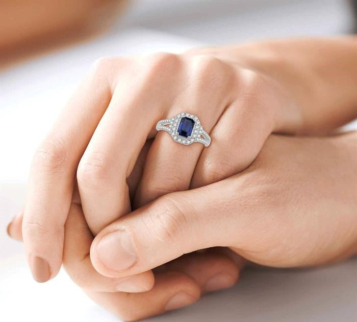 7x5 MM Emerald Shape Sapphire and 1/2 Ctw Round Cut Diamond Precious Ring in 14K White Gold