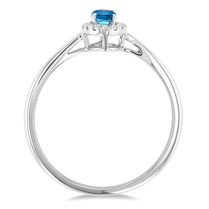5x3 MM Oval Shape Blue Topaz and 1/20 Ctw Round Cut Diamond Halo Semi-Precious Ring in 14K White Gold