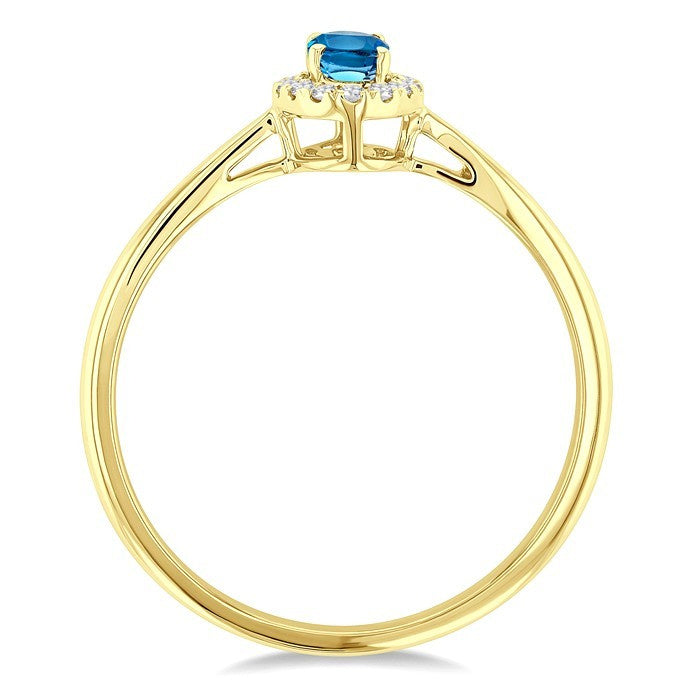 5x3 MM Oval Shape Blue Topaz and 1/20 Ctw Round Cut Diamond Halo Semi-Precious Ring in 10K Yellow Gold