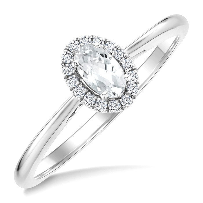 5x3 MM Oval Shape White Topaz and 1/20 Ctw Round Cut Diamond Halo Semi-Precious Ring in 10K White Gold