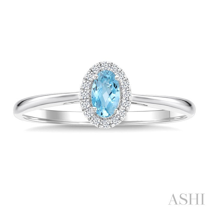 5x3 MM Oval Shape Aquamarine and 1/20 Ctw Round Cut Diamond Halo Semi-Precious Ring in 10K White Gold