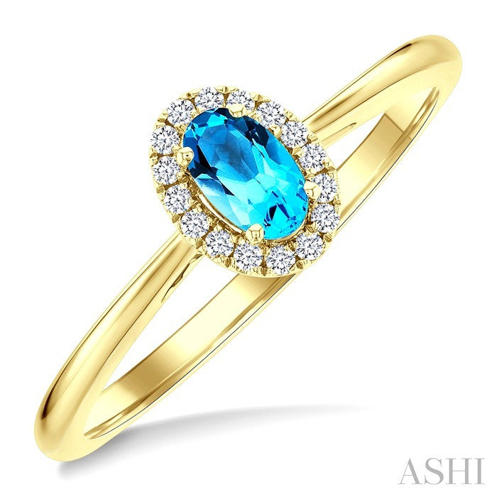 5x3 MM Oval Shape Blue Topaz and 1/20 Ctw Round Cut Diamond Halo Semi-Precious Ring in 10K Yellow Gold