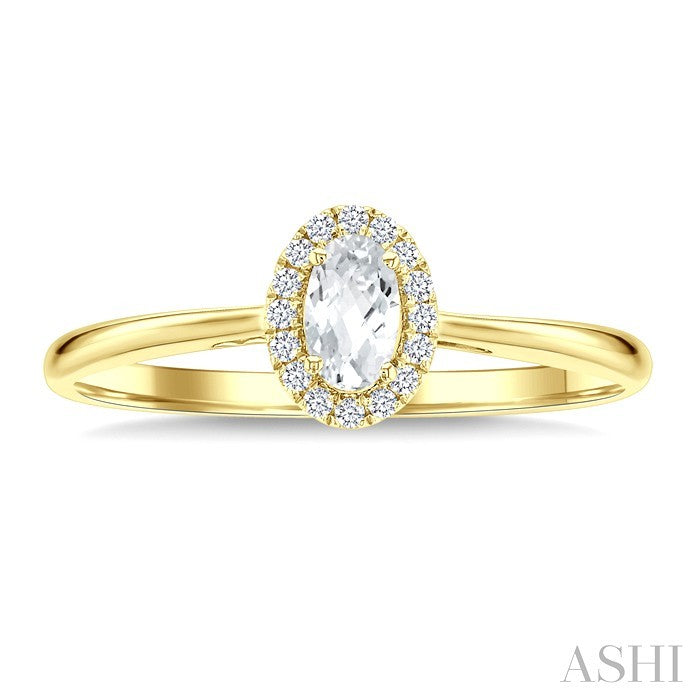 5x3 MM Oval Shape White Topaz and 1/20 Ctw Round Cut Diamond Halo Semi-Precious Ring in 10K Yellow Gold