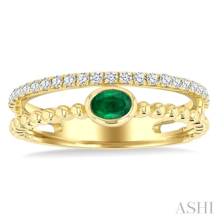 4x3 MM Oval Shape Emerald and 1/5 Ctw Round Cut Diamond Precious Fashion Split Twin Ring in 10K Yellow Gold