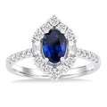 7x5 MM Oval Cut Sapphire & 5/8 Ctw Baguette and Round Cut Diamond Halo Precious Ring in 14K White Gold