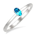 5X3 MM Oval Shape Blue Topaz Semi-Precious Solitaire Ring in 10K White Gold