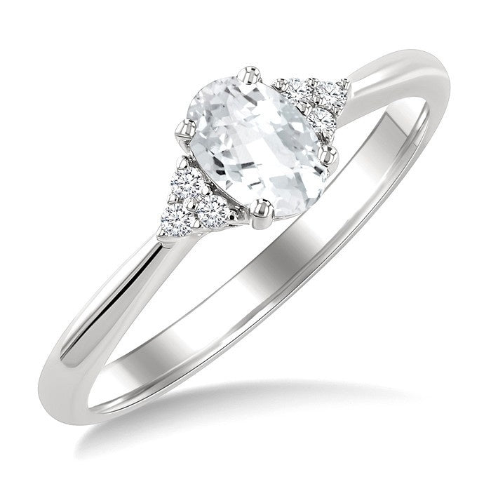 1/20 Ctw Oval Cut 6X4 MM White Topaz and Round Cut Diamond semi-precious Ring in 10K White Gold